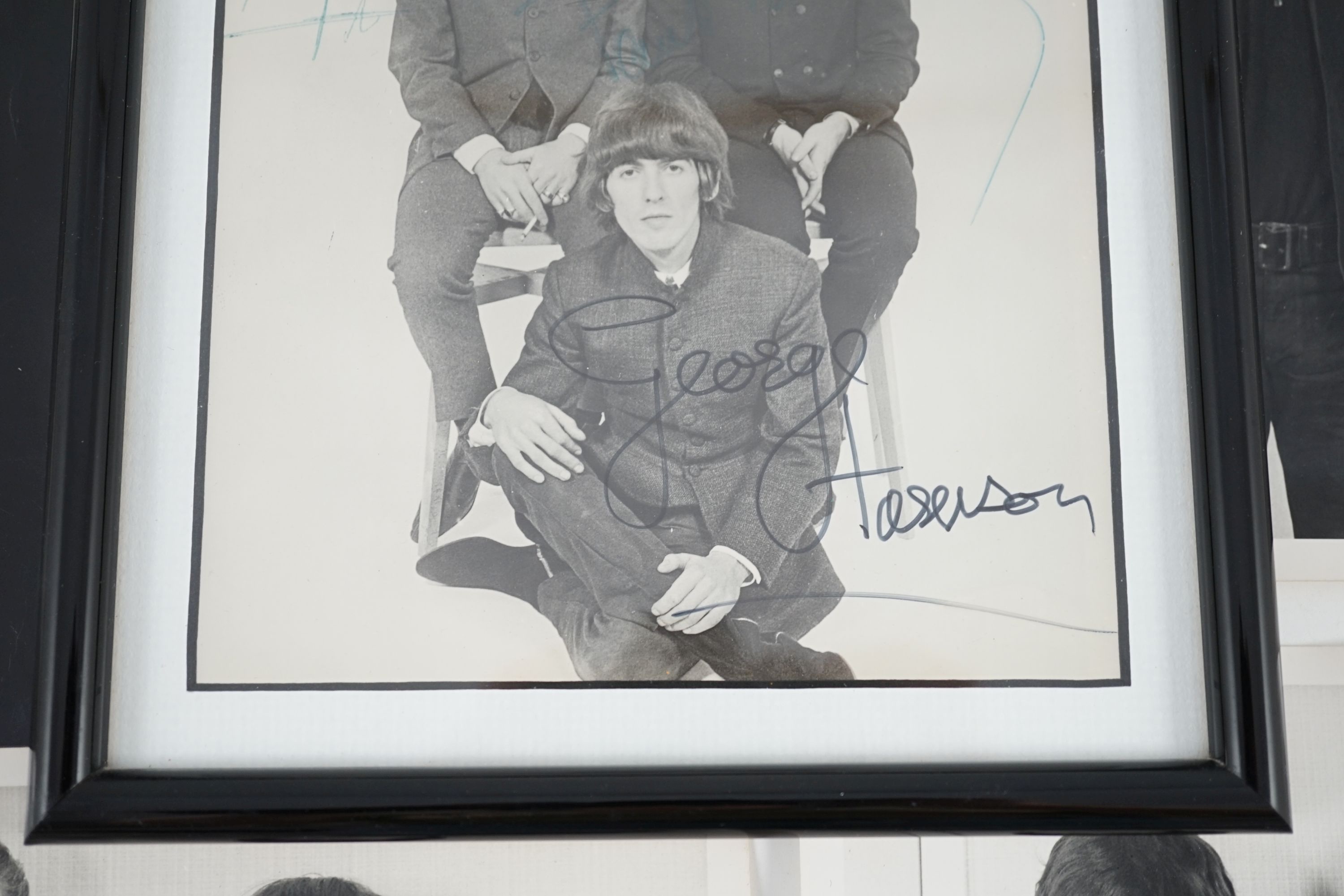 An autographed Beatles photograph and four related photographs of the Beatles with Peter Aldersley Autographed photo 19.5 x 14.5cm.